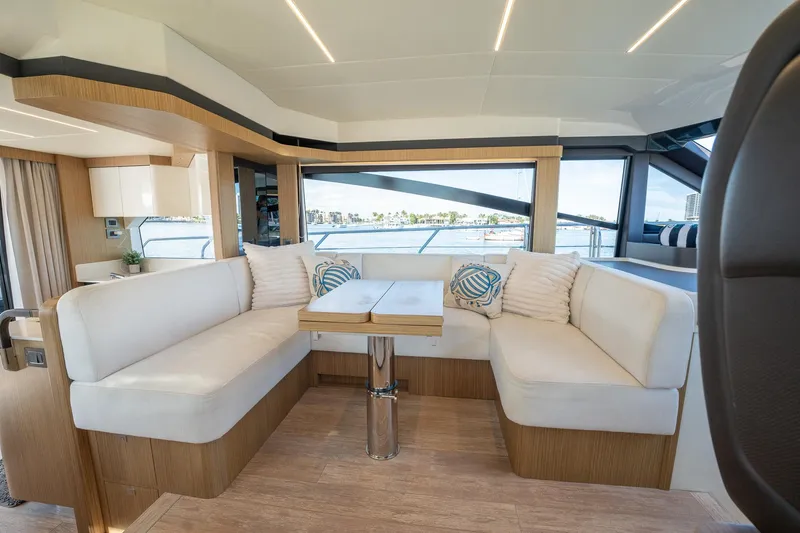 Holy Moly Yacht Photos Pics Luxurious interior of 2020 Absolute 50 Fly yacht with elegant seating and modern design.