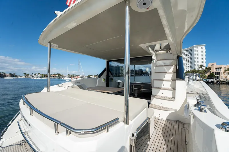 Holy Moly Yacht Photos Pics Luxury Absolute 50 Fly yacht, 2020 model, featuring spacious deck and modern design.