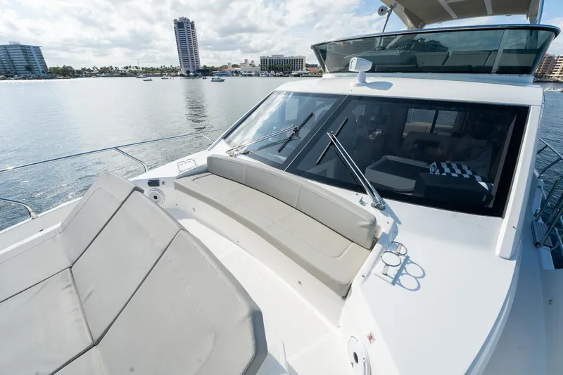 Holy Moly Yacht Photos Pics Luxury Absolute 50 Fly yacht, 2020 model, with spacious deck and waterfront view.