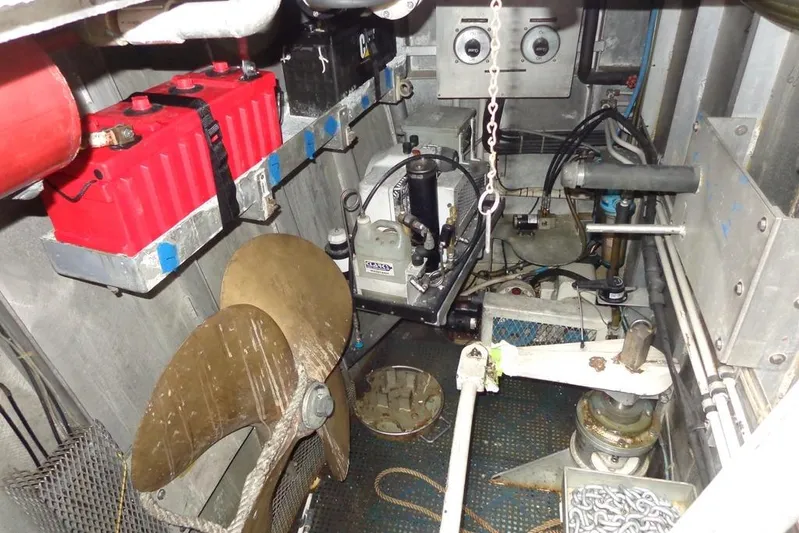  Yacht Photos Pics Engine room of 1988 Burger 80 Motor Yacht with batteries and mechanical components.