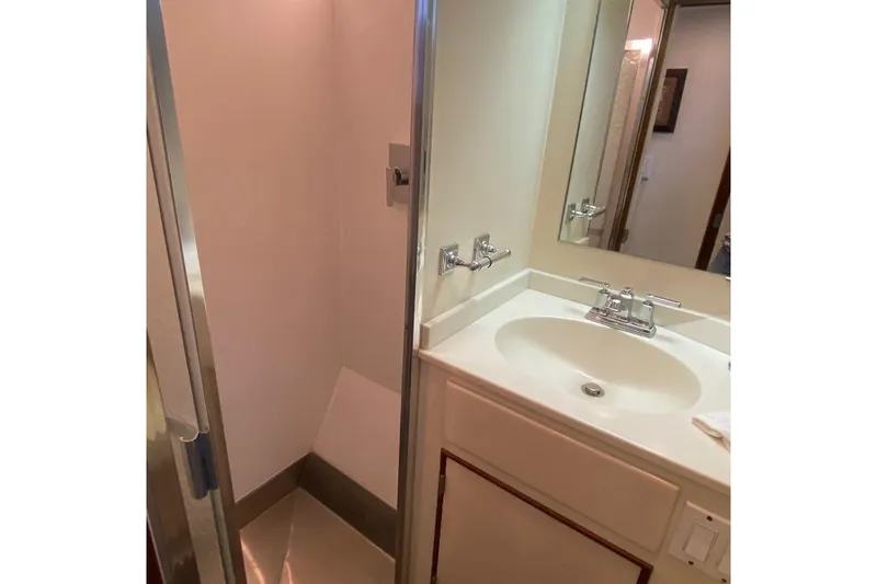  Yacht Photos Pics Bathroom interior of 1988 Burger 80 Motor Yacht with shower and sink.