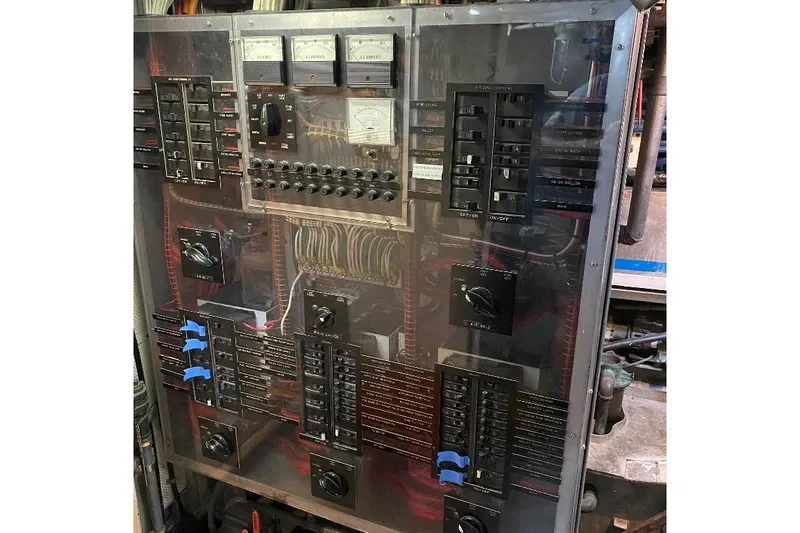  Yacht Photos Pics Electrical control panel on a 1988 Burger 80 Motor Yacht, featuring switches and meters.