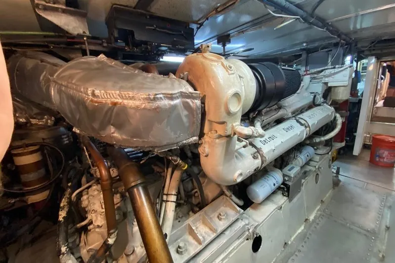  Yacht Photos Pics Engine room of a 1988 Burger 80 Motor Yacht, showcasing detailed machinery components.