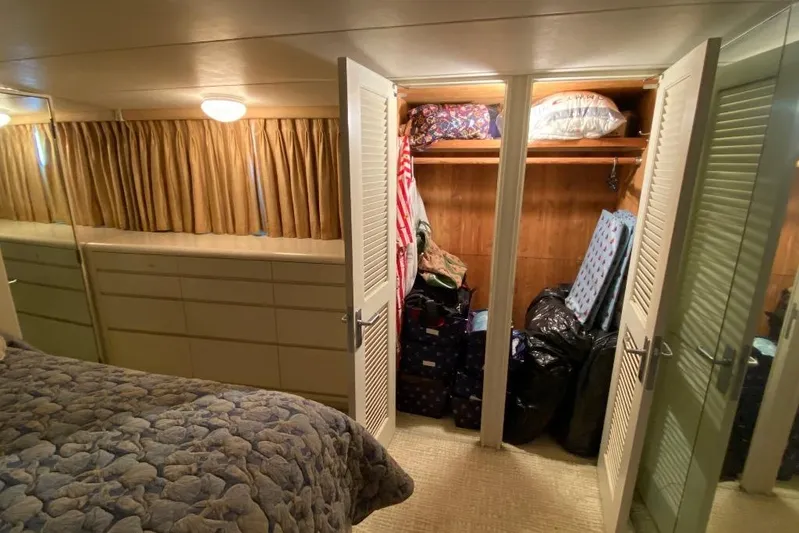  Yacht Photos Pics Interior of 1988 Burger 80 Motor Yacht bedroom with closet and storage.