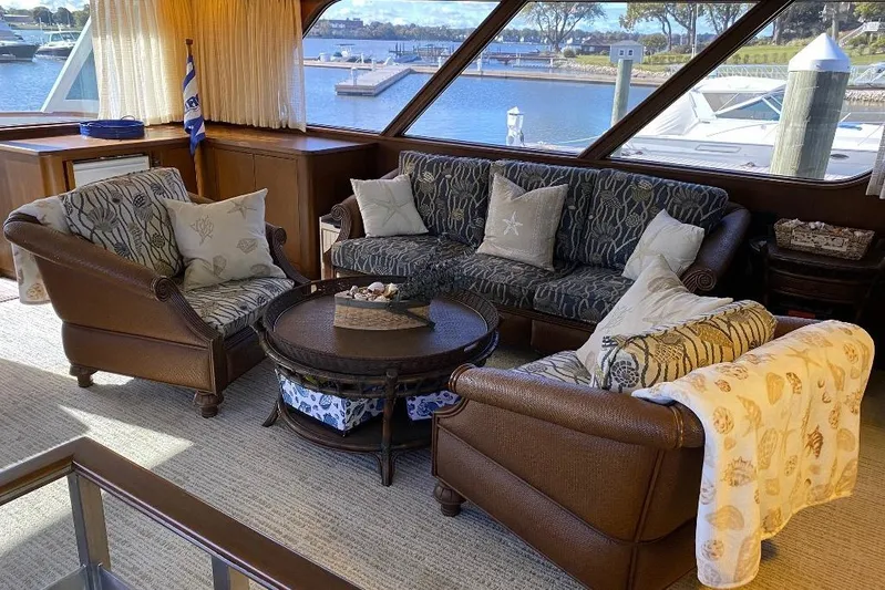  Yacht Photos Pics Luxurious interior of 1988 Burger 80 Motor Yacht with elegant seating and waterfront view.