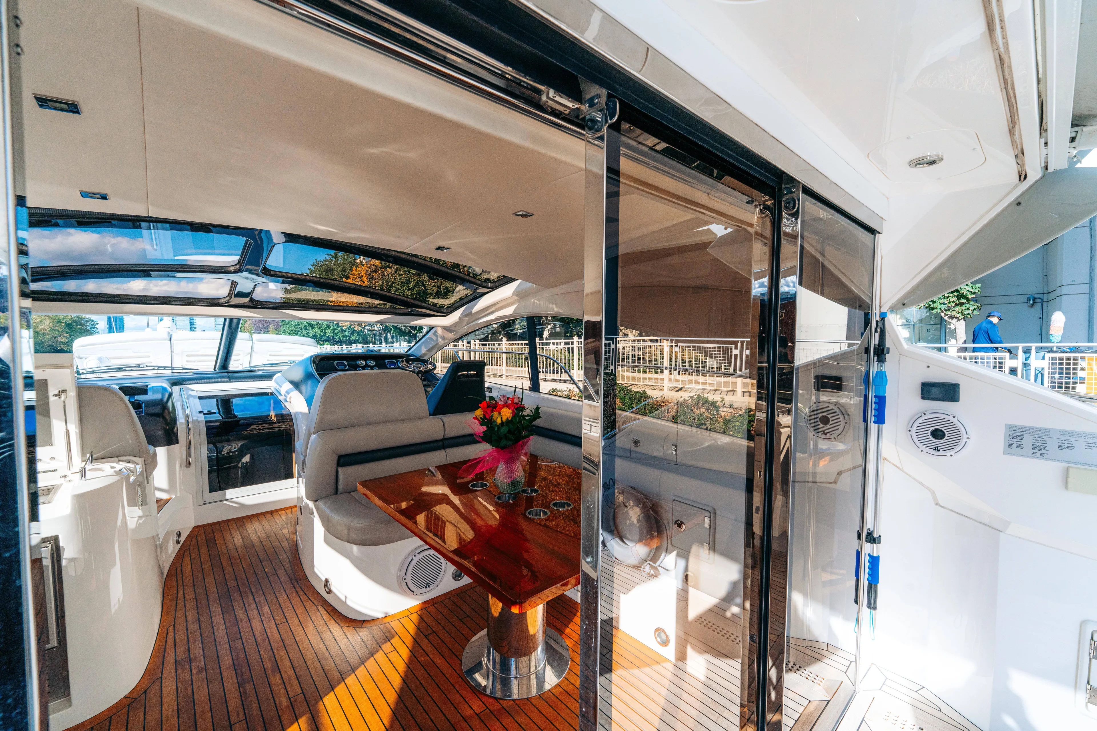  Yacht Photos Pics Luxurious interior of 2014 Sunseeker Predator 60 yacht with elegant seating and wooden flooring.