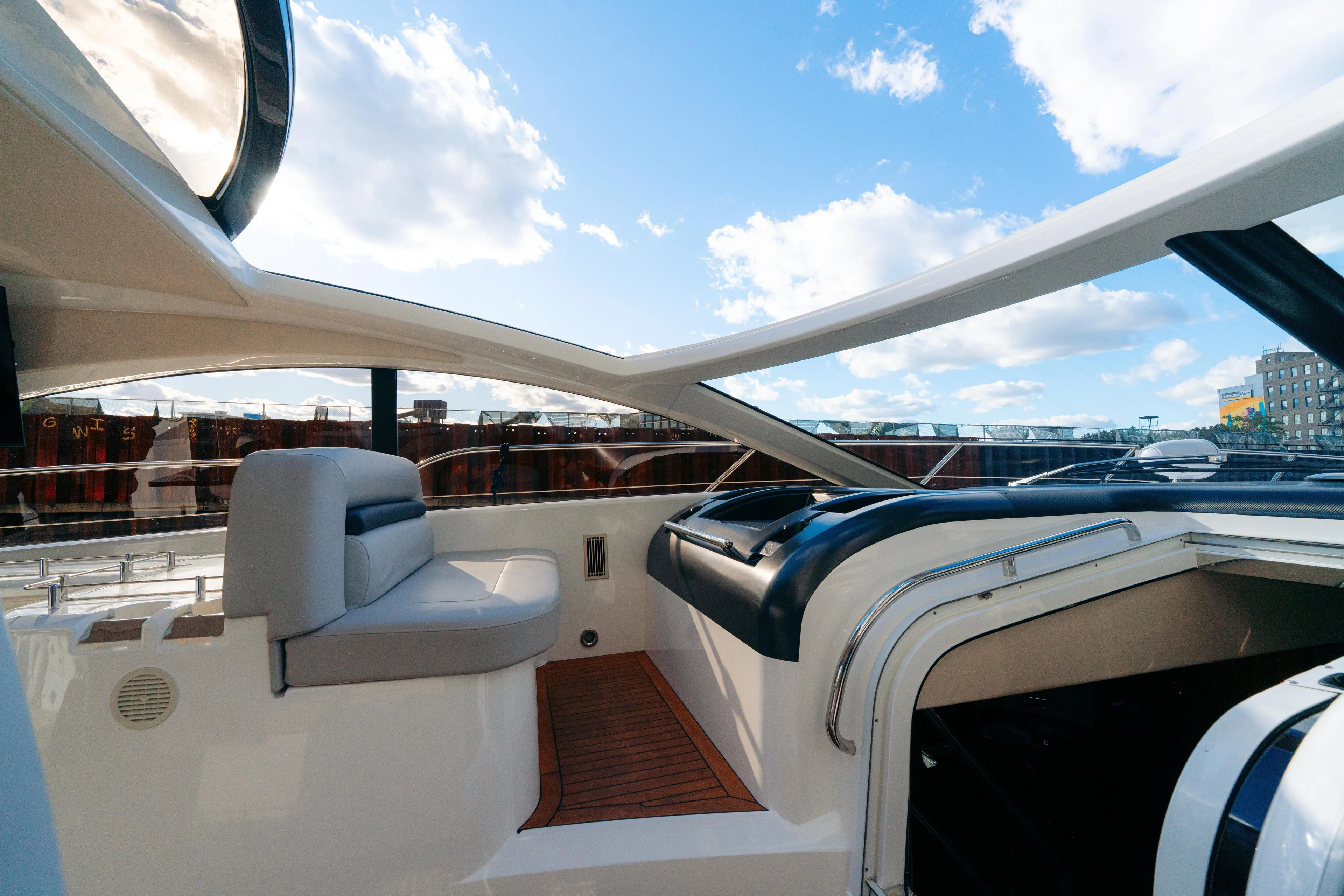  Yacht Photos Pics Interior view of 2014 Sunseeker Predator 60 yacht with sleek design and open sky.