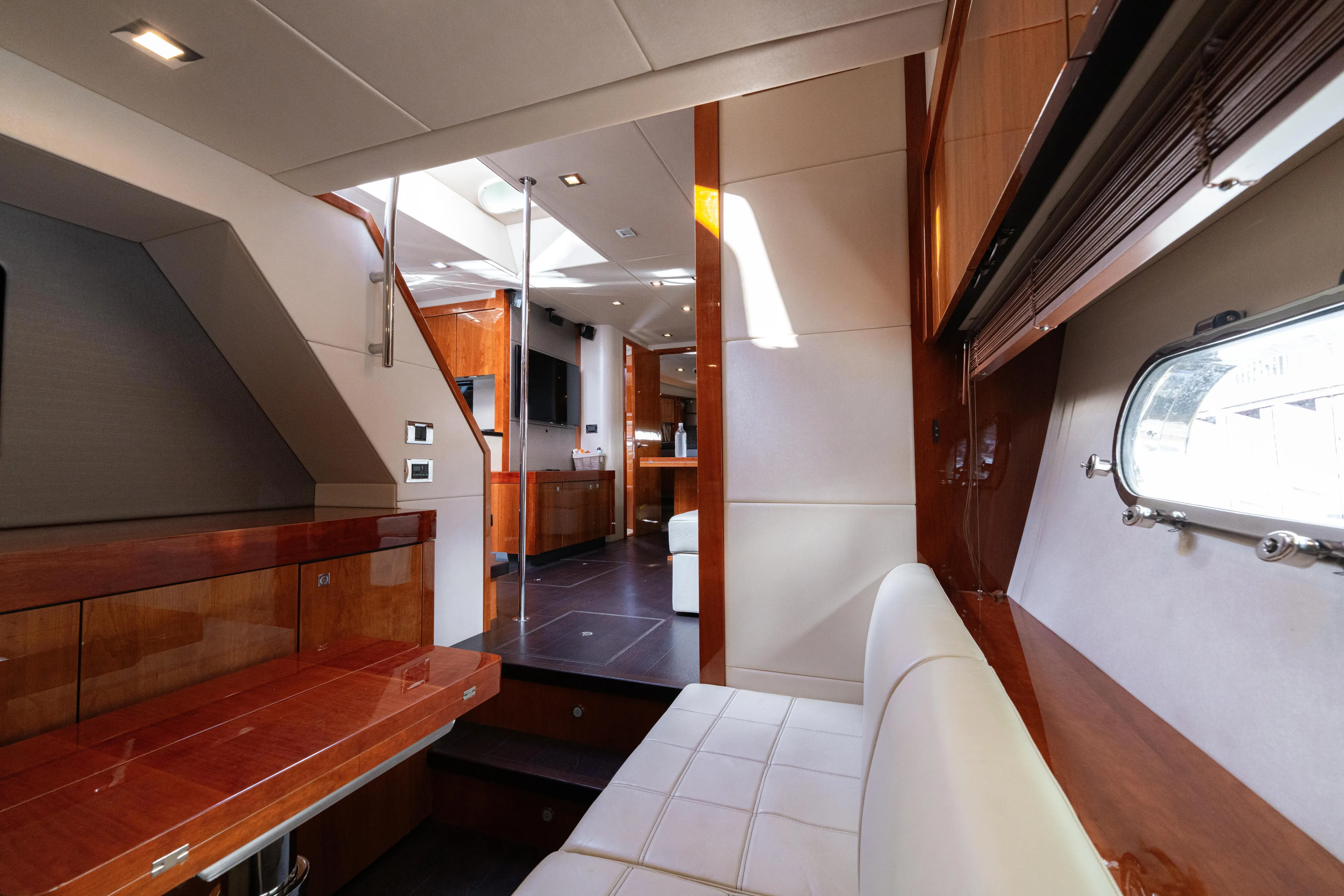  Yacht Photos Pics Luxurious interior of 2014 Sunseeker Predator 60 yacht with elegant wood finishes.