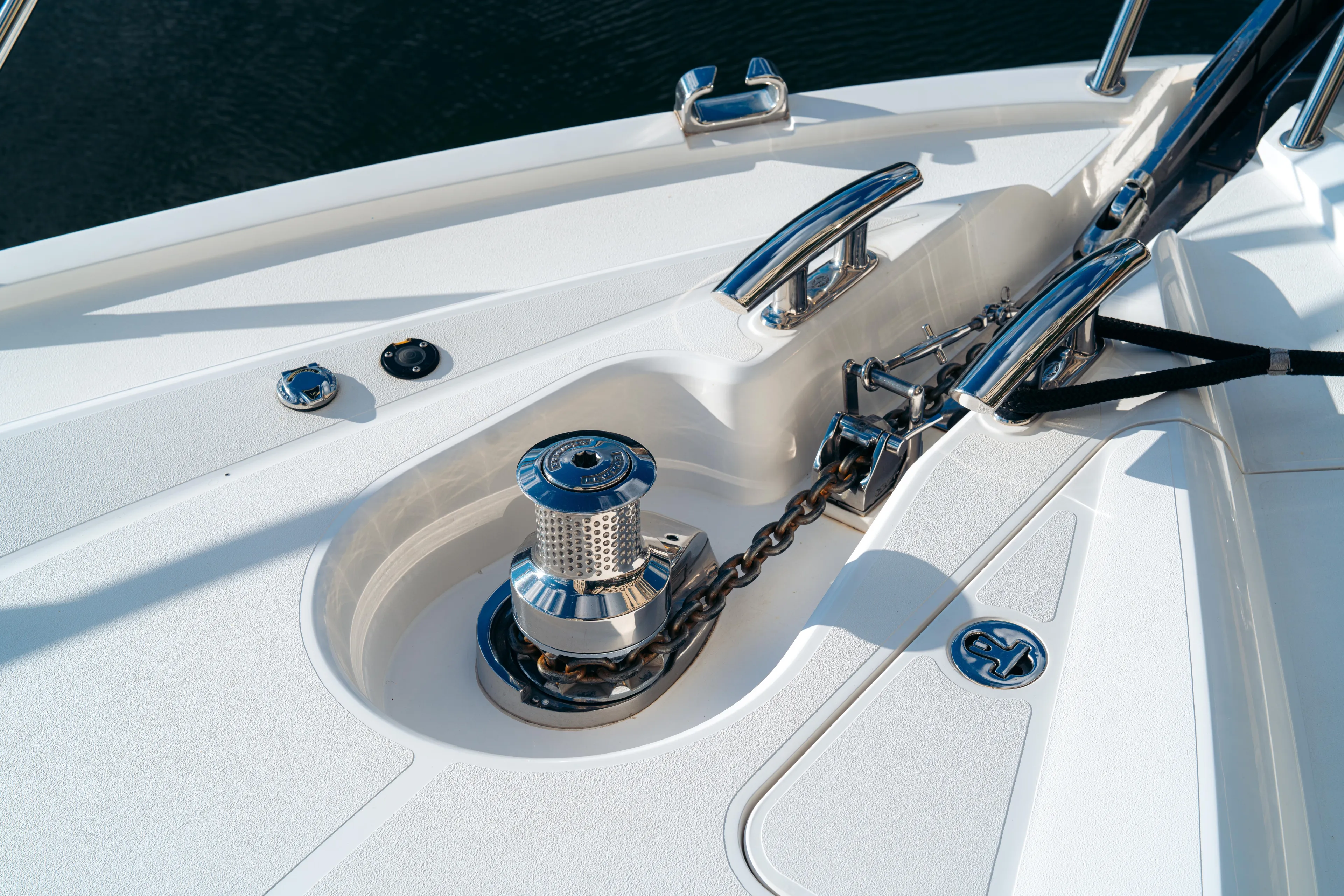  Yacht Photos Pics Close-up of 2014 Sunseeker Predator 60 yacht's anchor winch and chain system.