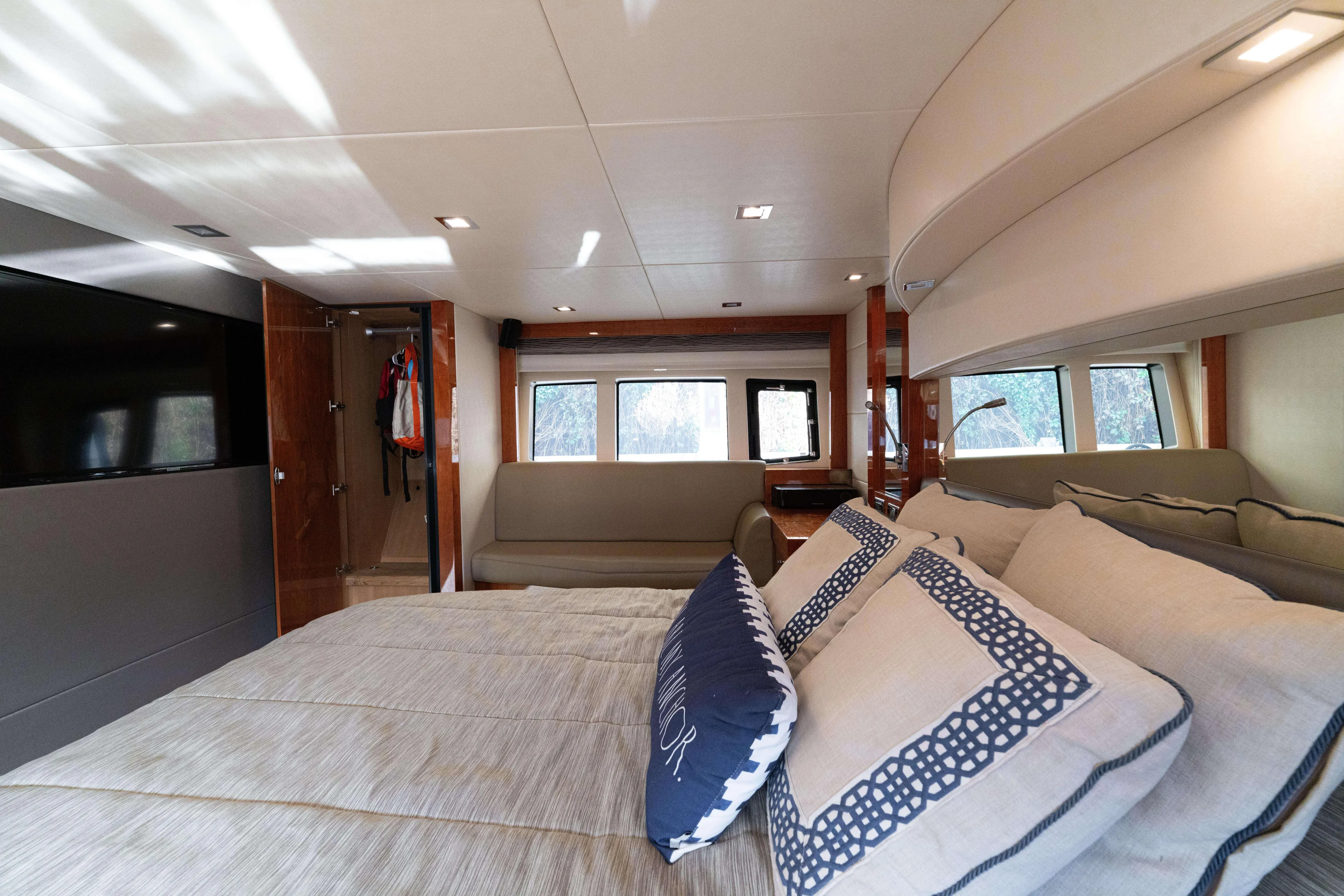  Yacht Photos Pics Luxurious interior of 2014 Sunseeker Predator 60 yacht with elegant bedroom and modern amenities.