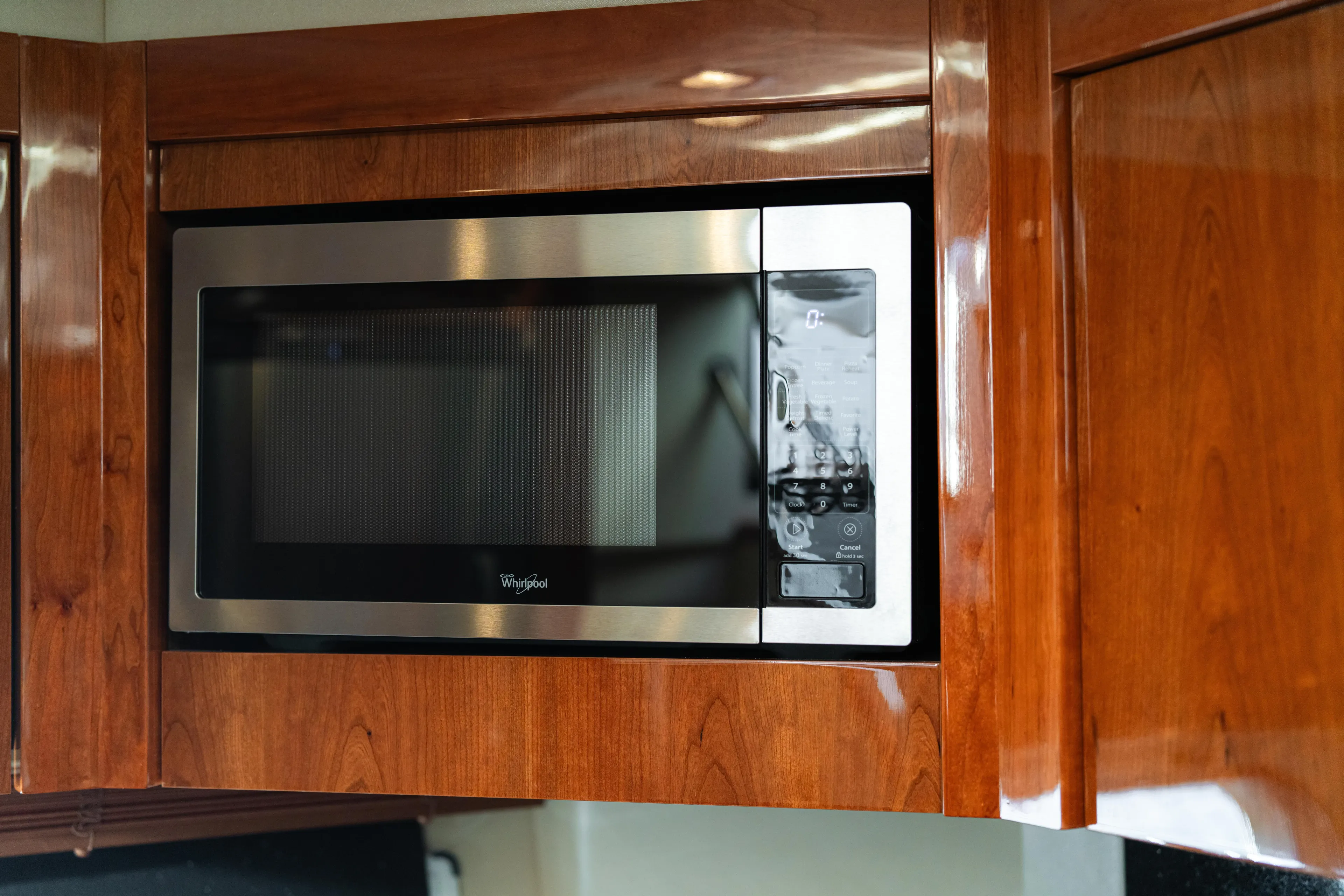  Yacht Photos Pics Whirlpool microwave in wooden cabinet on Sunseeker Predator 60 yacht, 2014 model.