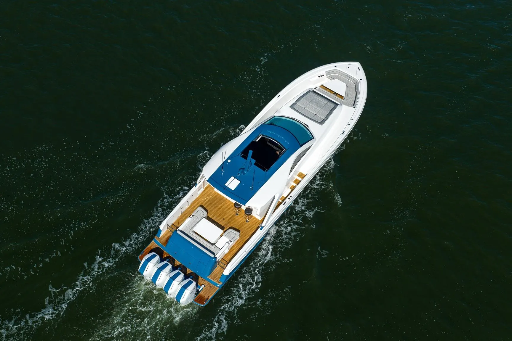 Aerial view of 2026 Valhalla V-55 Sport Yacht cruising on open water.