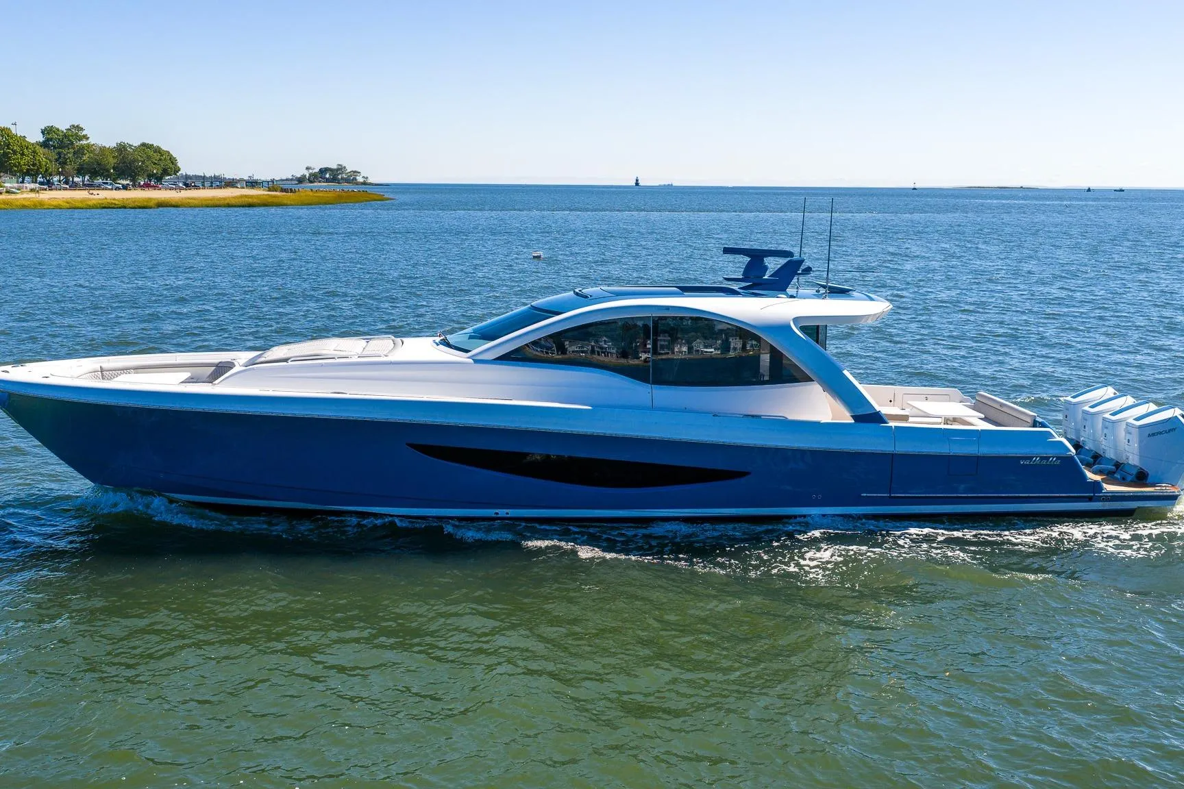 2026 Valhalla Boatworks V-55 Sport Yacht cruising on open water.