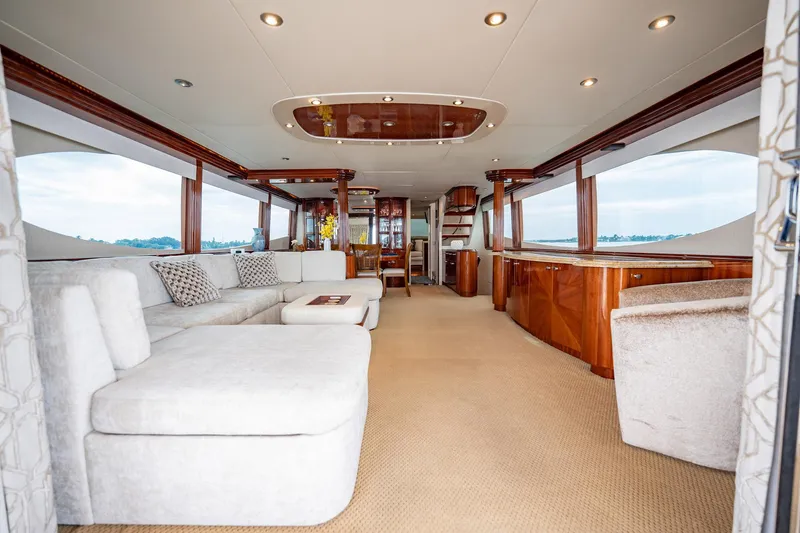 Water Ranch Yacht Photos Pics Luxurious interior of 2003 Lazzara 80 EB yacht with elegant furnishings and panoramic windows.