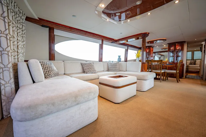 Water Ranch Yacht Photos Pics Luxurious interior of 2003 Lazzara 80 EB yacht with elegant seating and dining area.