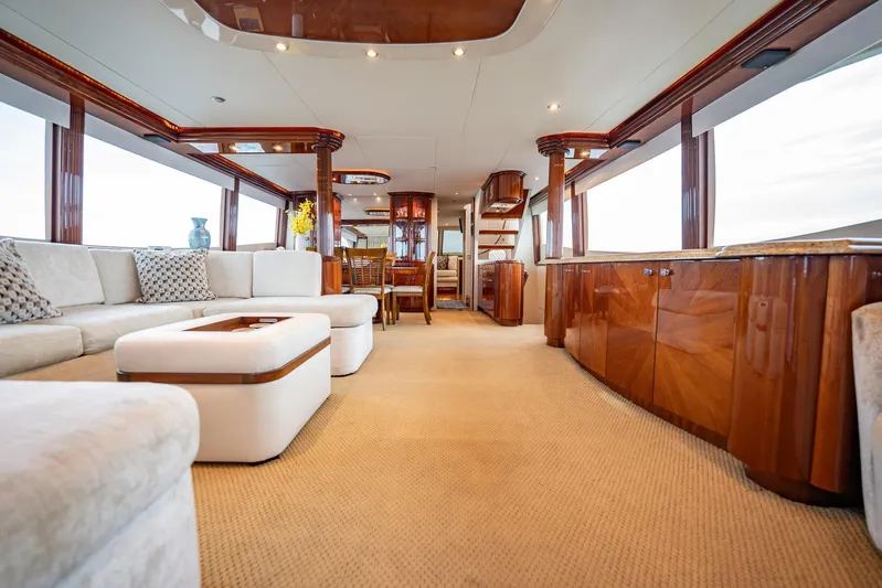 Water Ranch Yacht Photos Pics Luxurious interior of 2003 Lazzara 80 EB yacht with elegant furnishings and panoramic windows.