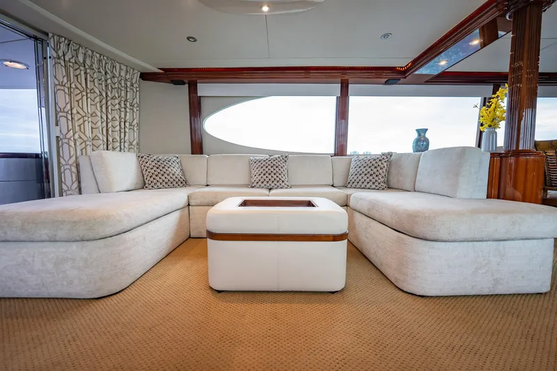 Water Ranch Yacht Photos Pics Luxurious interior of 2003 Lazzara 80 EB yacht with plush seating and elegant decor.