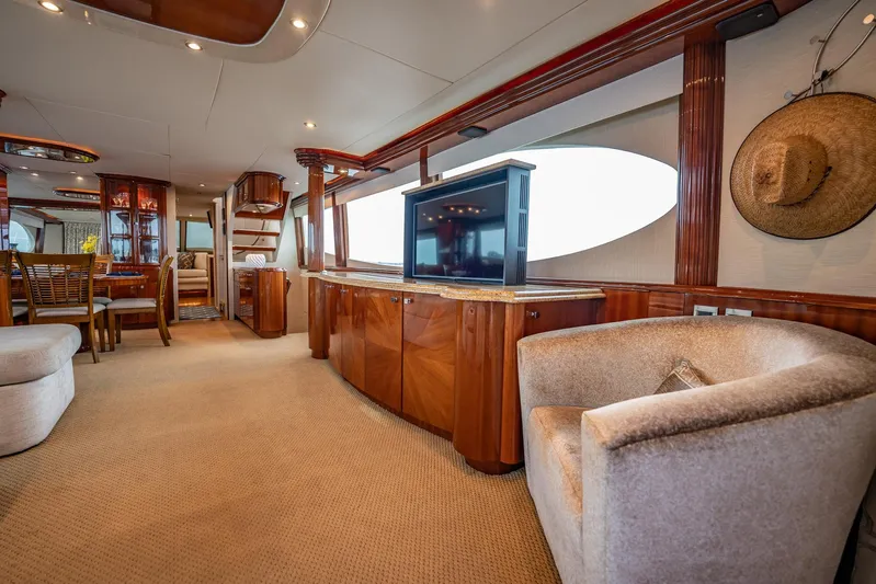 Water Ranch Yacht Photos Pics Luxurious interior of 2003 Lazzara 80 EB yacht with elegant wood finishes and modern amenities.