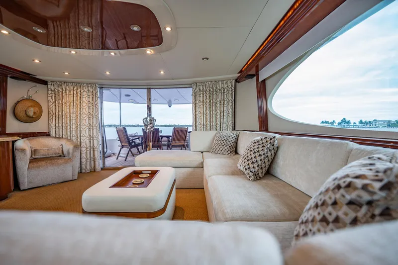 Water Ranch Yacht Photos Pics Luxurious interior of 2003 Lazzara 80 EB yacht with elegant seating and ocean view.