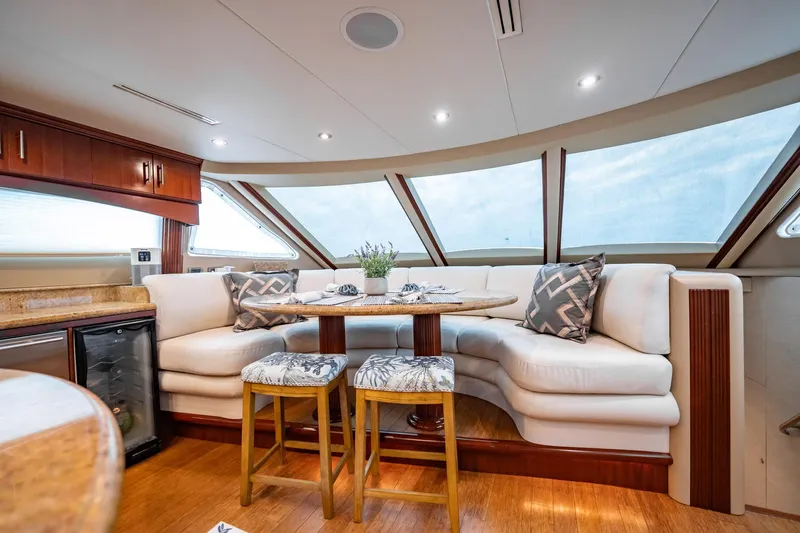 Water Ranch Yacht Photos Pics Luxurious interior of 2003 Lazzara 80 EB yacht with elegant dining area.