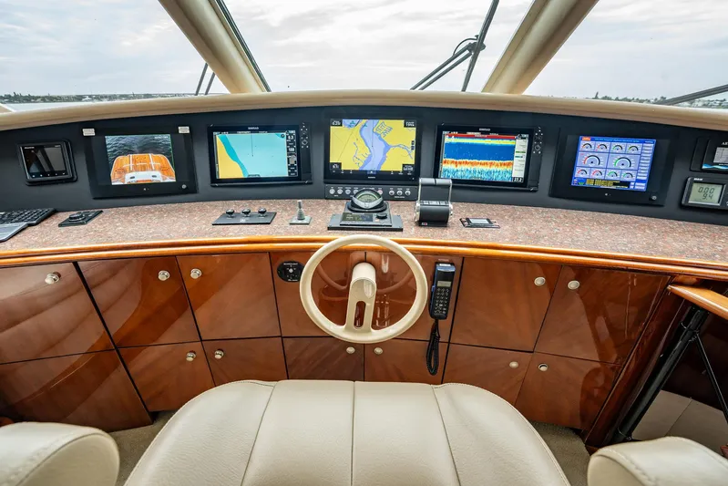 Water Ranch Yacht Photos Pics Cockpit of 2003 Lazzara 80 EB yacht with navigation screens and controls.