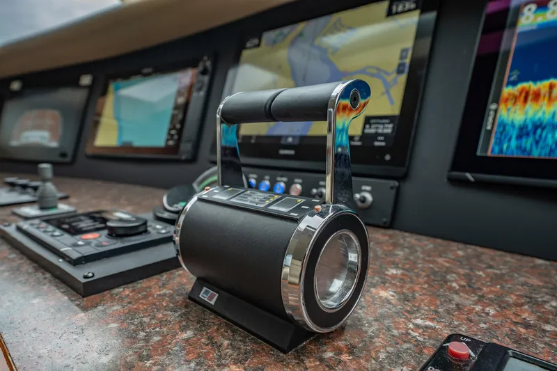 Water Ranch Yacht Photos Pics Control panel of 2003 Lazzara 80 EB yacht with navigation screens and throttle lever.