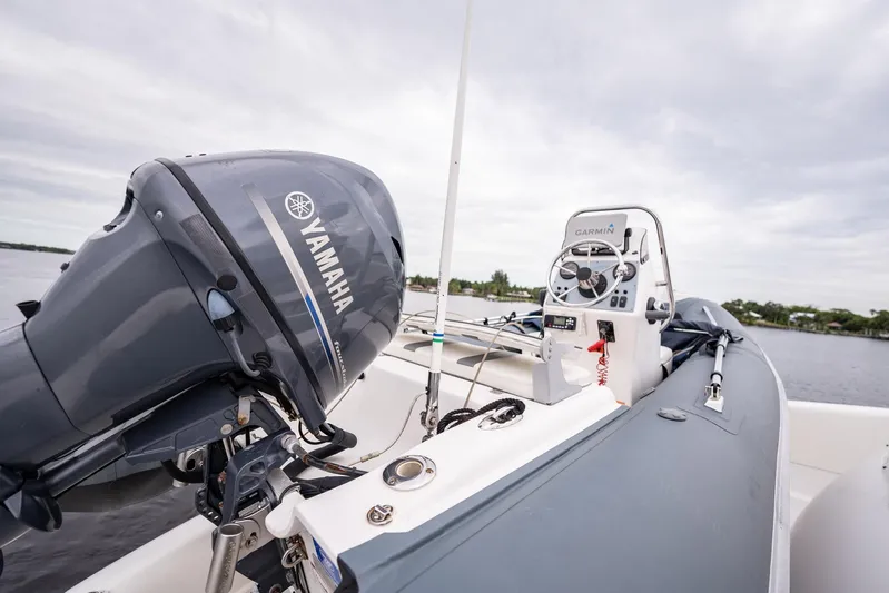 Water Ranch Yacht Photos Pics 2003 Lazzara 80 EB yacht with Yamaha engine and Garmin navigation system on calm waters.