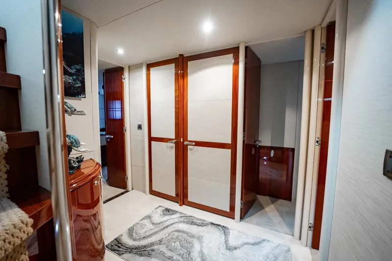 Water Ranch Yacht Photos Pics Luxurious interior of 2003 Lazzara 80 EB yacht with elegant wood finishes.