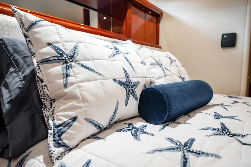Water Ranch Yacht Photos Pics Luxurious bedding with starfish design in 2003 Lazzara 80 EB yacht cabin.