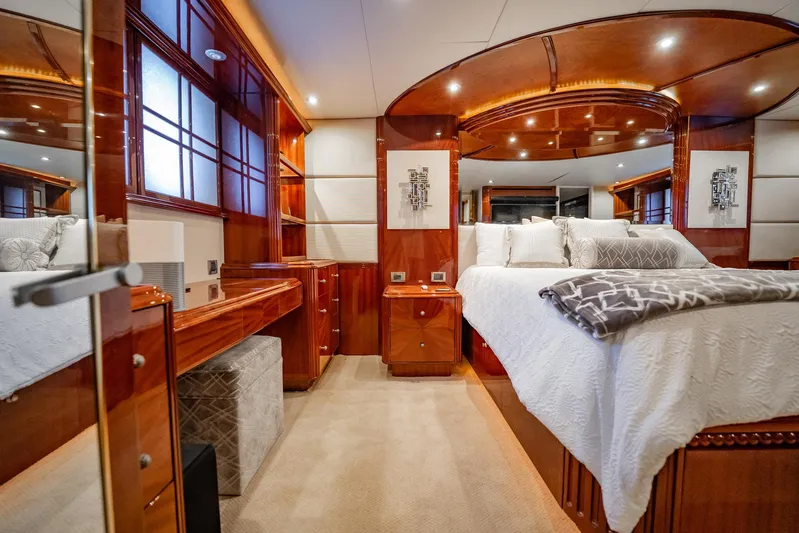 Water Ranch Yacht Photos Pics Luxurious bedroom interior of 2003 Lazzara 80 EB yacht with elegant wood finishes.