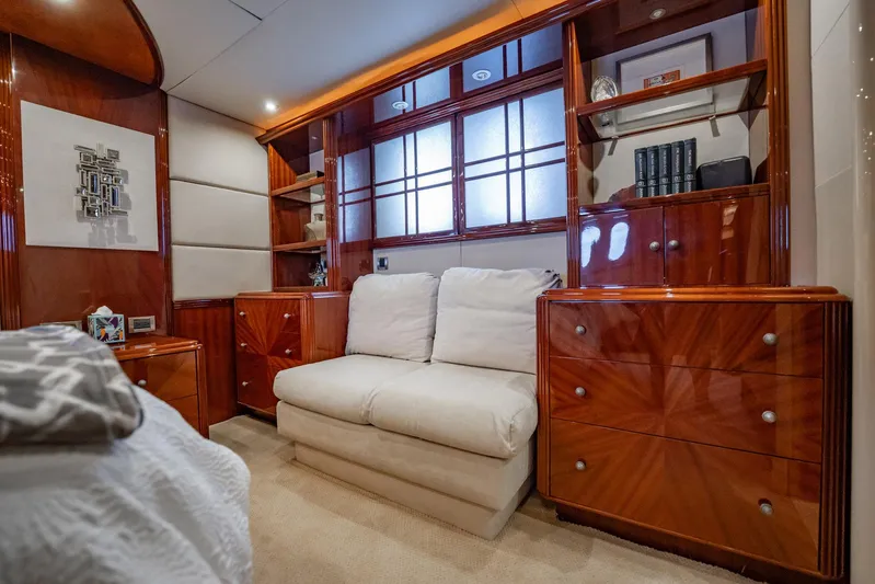 Water Ranch Yacht Photos Pics Luxurious interior of 2003 Lazzara 80 EB yacht with elegant wood cabinetry and plush seating.