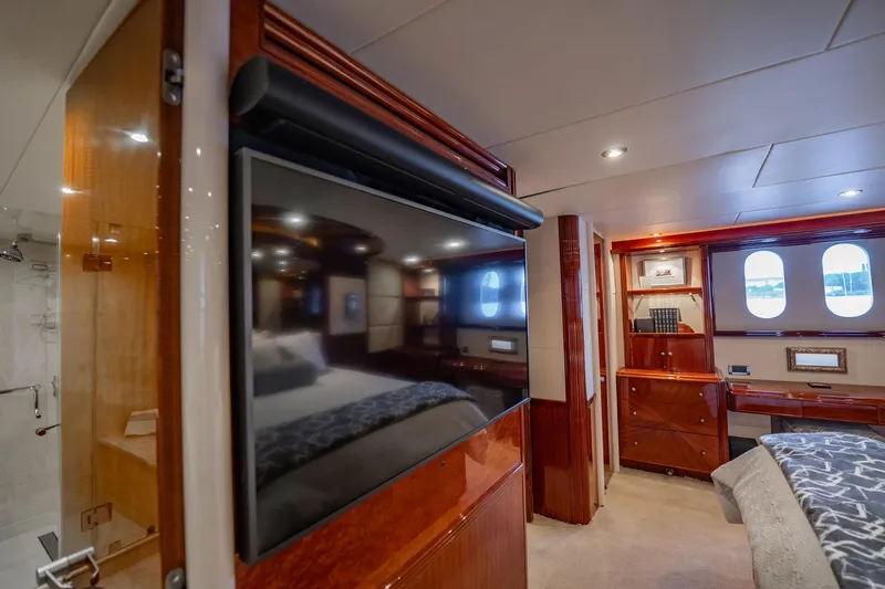 Water Ranch Yacht Photos Pics Luxurious interior of 2003 Lazzara 80 EB yacht with elegant wood finishes and modern amenities.