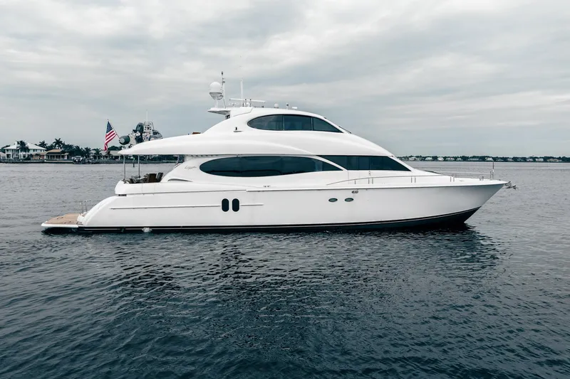 Water Ranch Yacht Photos Pics Luxury 2003 Lazzara 80 EB yacht on calm waters, showcasing sleek design and elegance.