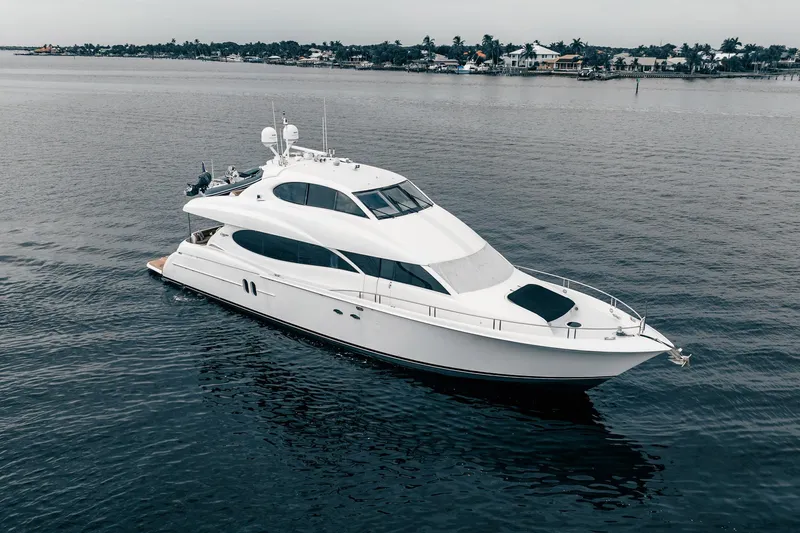 Water Ranch Yacht Photos Pics Luxury 2003 Lazzara 80 EB yacht cruising on calm waters.