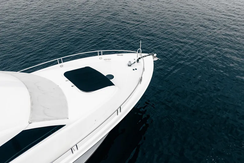 Water Ranch Yacht Photos Pics 2003 Lazzara 80 EB yacht on calm blue water, aerial view.