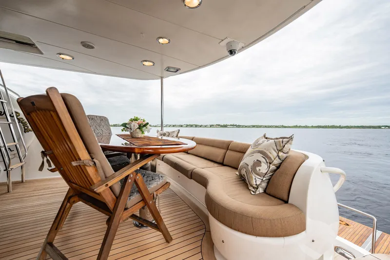 Water Ranch Yacht Photos Pics Luxurious 2003 Lazzara 80 EB yacht deck with elegant seating and ocean view.