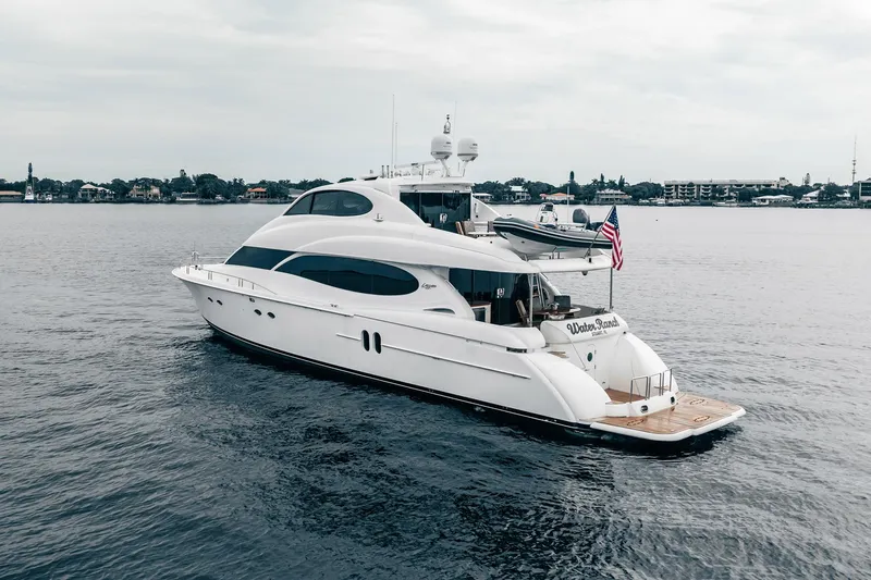 Water Ranch Yacht Photos Pics Luxury 2003 Lazzara 80 EB yacht cruising on calm waters.