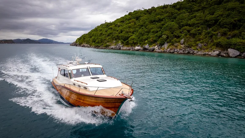 Trident Yacht Photos Pics Maverick Yachts Costa Rica 50 cruising near lush coastline, 2015 model.