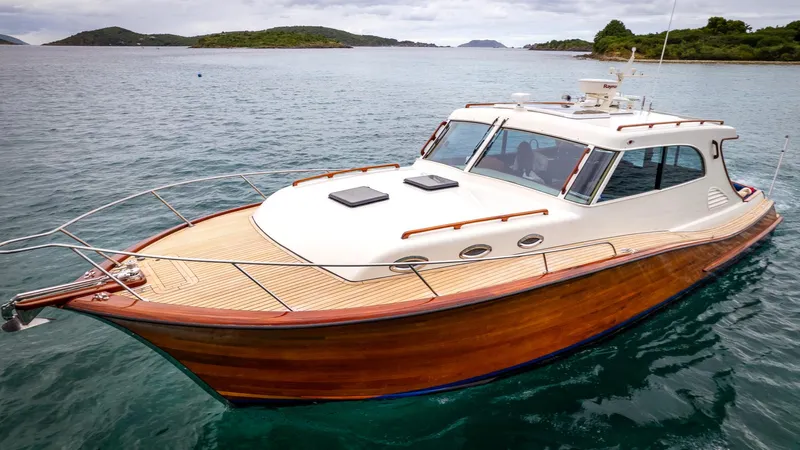 Trident Yacht Photos Pics 2015 Maverick Yachts Costa Rica 50 cruising on serene waters with lush islands in the background.