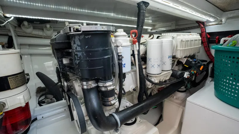 Trident Yacht Photos Pics Engine room of 2015 Maverick Yachts Costa Rica 50, showcasing mechanical components and systems.