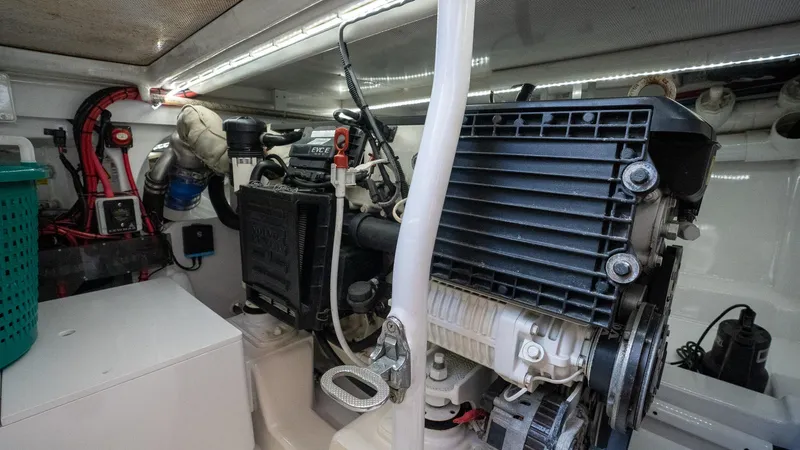 Trident Yacht Photos Pics Engine room of 2015 Maverick Yachts Costa Rica 50, showcasing mechanical components and wiring.