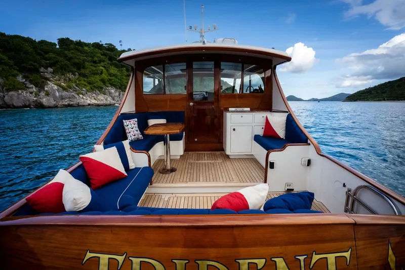 Trident Yacht Photos Pics Luxurious 2015 Maverick Yachts Costa Rica 50 with elegant seating, cruising in scenic waters.