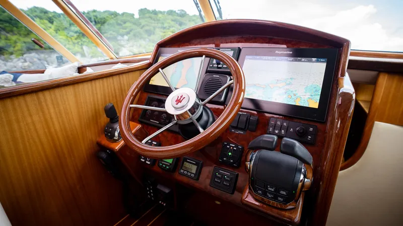 Trident Yacht Photos Pics Helm of 2015 Maverick Yachts Costa Rica 50 with navigation screens and controls.