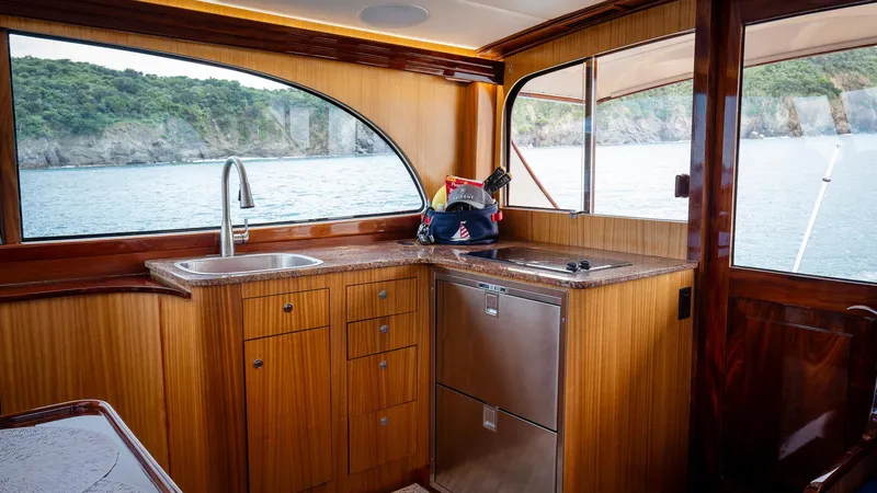 Trident Yacht Photos Pics Luxurious 2015 Maverick Yachts Costa Rica 50 interior with wooden cabinetry and ocean view.