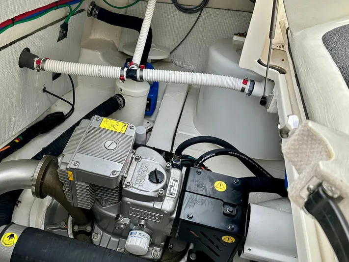 Encore Yacht Photos Pics Engine compartment of a 2017 Sabre 42 Salon Express boat, showcasing mechanical components.