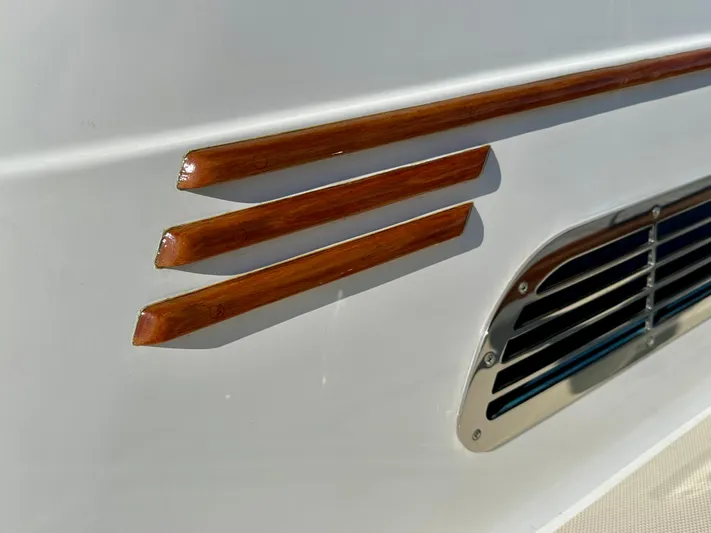 Encore Yacht Photos Pics 2017 Sabre 42 Salon Express detail with wooden accents and metal vent.