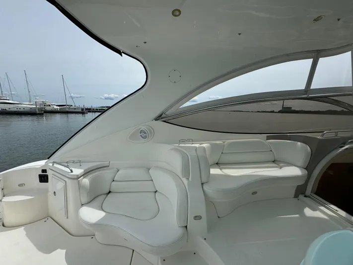  Yacht Photos Pics Luxurious seating area on 2003 Cruisers Yachts 540 Express, docked at marina.