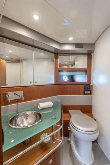 Vimojal II Yacht Photos Pics Luxurious bathroom in 2009 Riva 52' LE yacht with modern fixtures and elegant design.