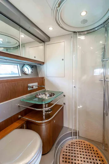 Vimojal II Yacht Photos Pics Luxurious bathroom in 2009 Riva 52' LE yacht with modern fixtures and elegant design.