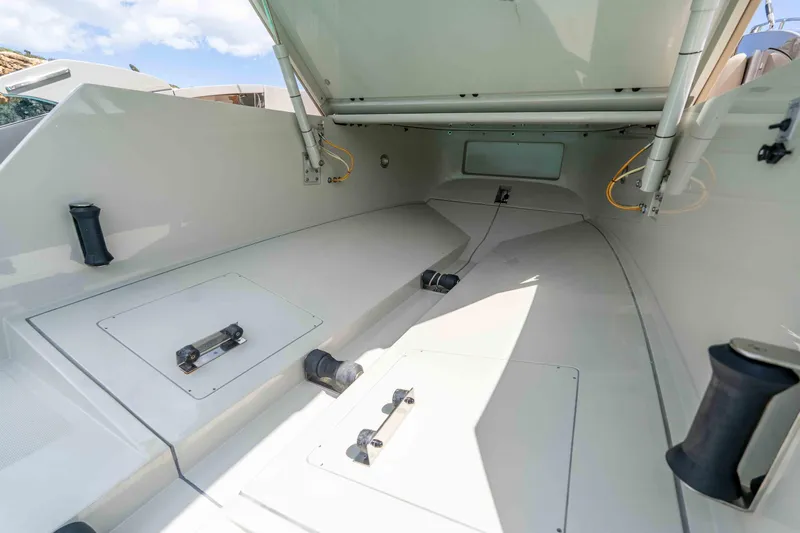 Vimojal II Yacht Photos Pics Interior view of a 2009 Riva 52' le yacht, showcasing spacious storage compartments.